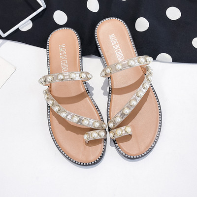 Μοντέρνες γυναικείες παντόφλες με μαργαριτάρια σε δύο χρώματα