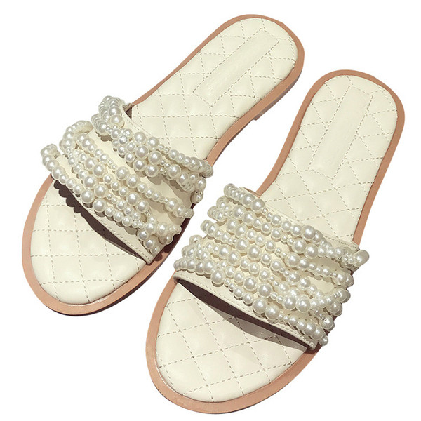 Γυναικείες  χαμηλές παντόφλες με μαργαριτάρια διακόσμησης σε λευκό και μαύρο χρώμα