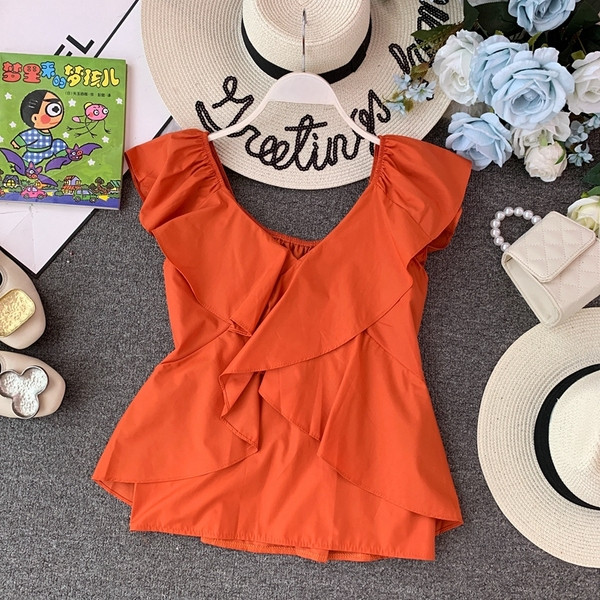 Modern női felső V-nyakkal, négy színben