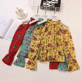 Bluză de damă elegantă cu mâneci lungi și motiv floral