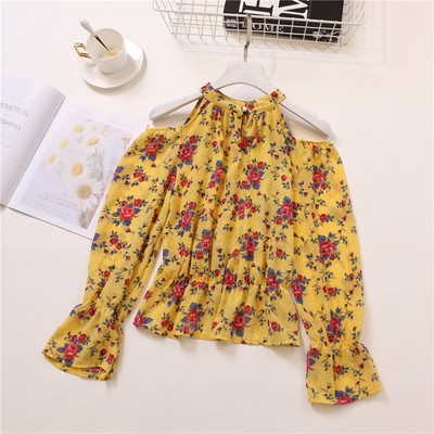 Bluză de damă elegantă cu mâneci lungi și motiv floral