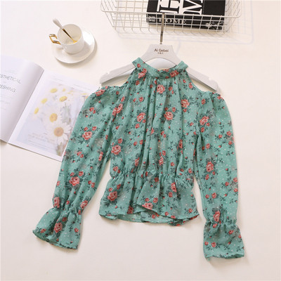 Bluză de damă elegantă cu mâneci lungi și motiv floral