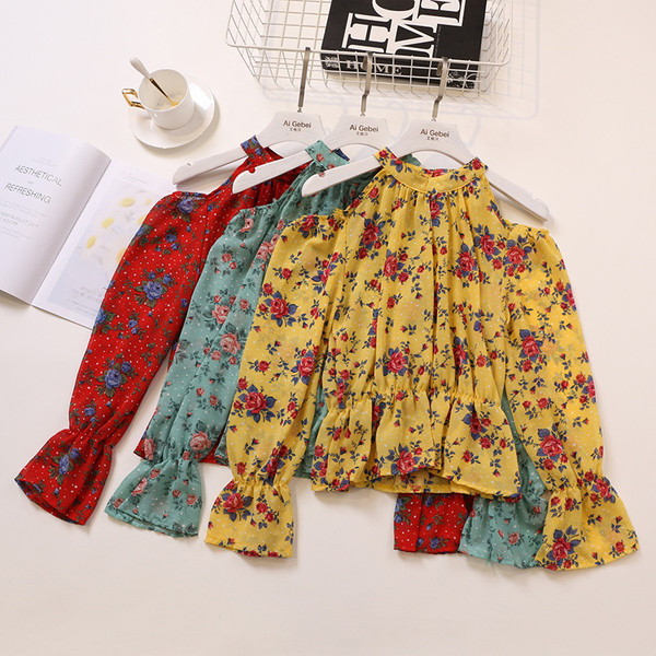 Bluză de damă elegantă cu mâneci lungi și motiv floral