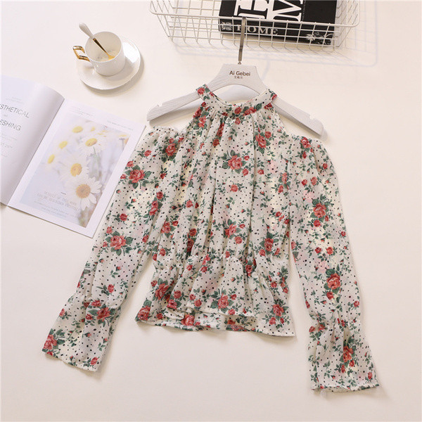 Bluză de damă elegantă cu mâneci lungi și motiv floral