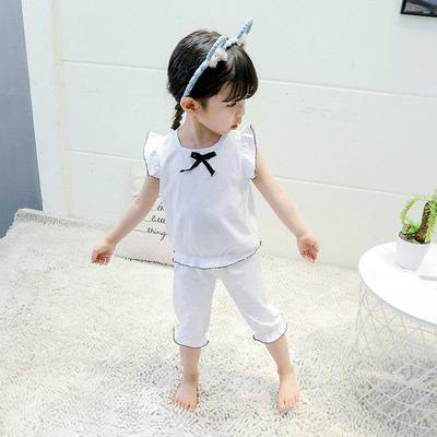 Gyerek pizsama lányoknak fehér és rózsaszín színben, szalaggal