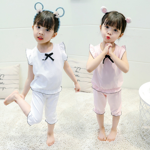 Gyerek pizsama lányoknak fehér és rózsaszín színben, szalaggal