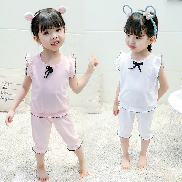 Gyerek pizsama lányoknak fehér és rózsaszín színben, szalaggal