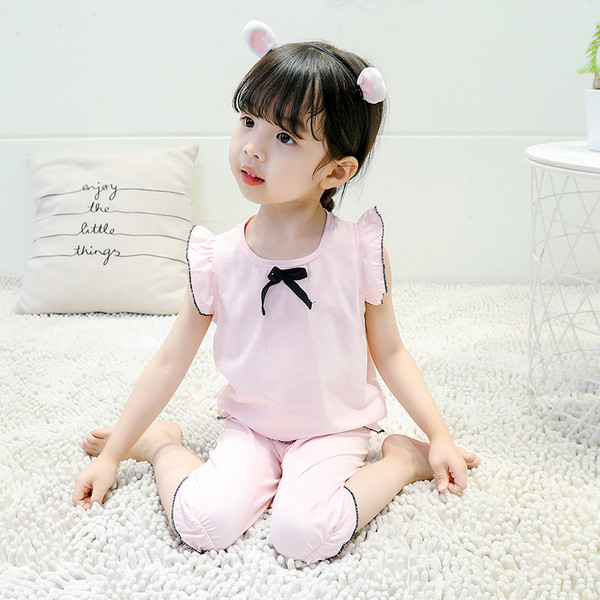 Gyerek pizsama lányoknak fehér és rózsaszín színben, szalaggal