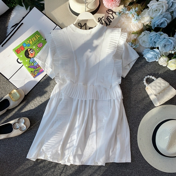 Modern női blúz O-nyakkal, fehér színben