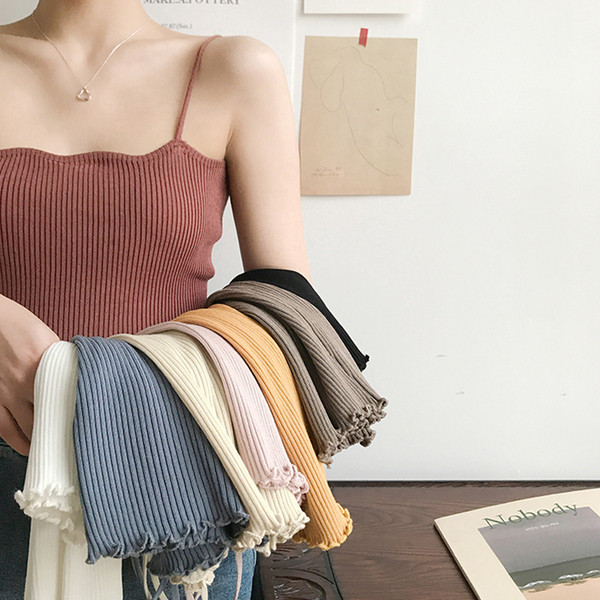 Vékony kötésből készült női felső, különböző színekben