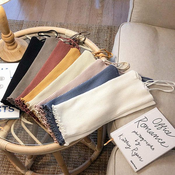 Vékony kötésből készült női felső, különböző színekben