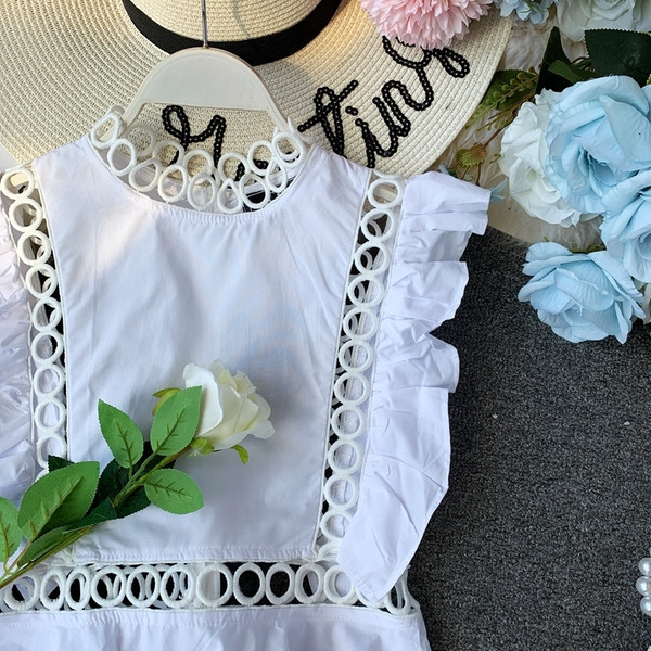 Modern női felső, fekete-fehér, hímzéssel