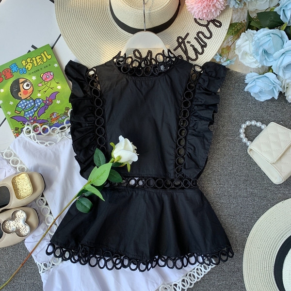 Modern női felső, fekete-fehér, hímzéssel