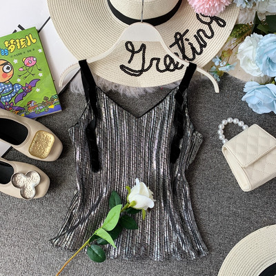 Modern női felső négy színben fém elemmel