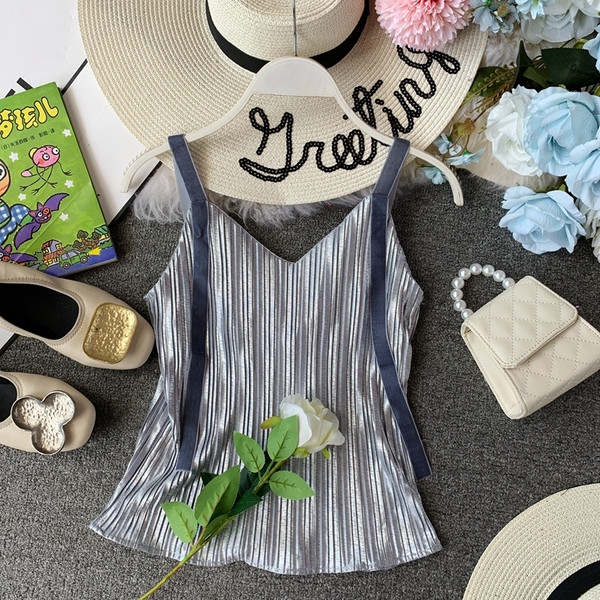 Modern női felső négy színben fém elemmel