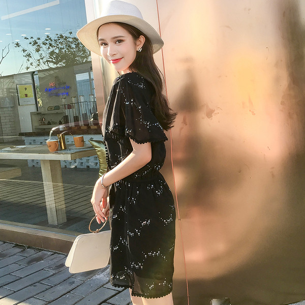 Stílusos női jumpsuit V-nyakkal, fekete és rózsaszín színben