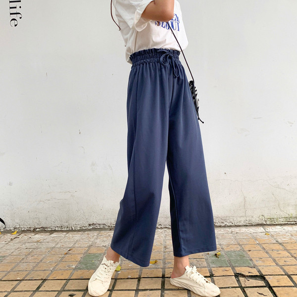 Alkalmi női nadrág nyakkendővel, három színben