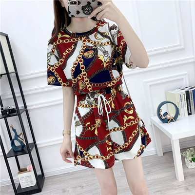 Модерен дамски комплект от две части с връзки и цветен принт