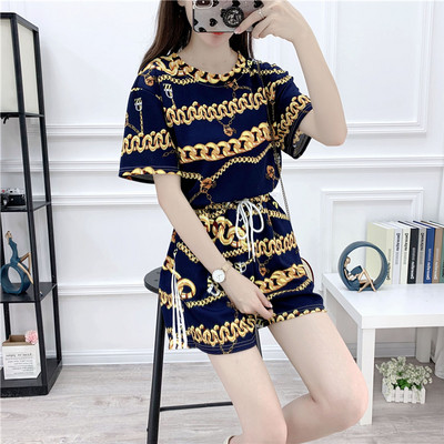 Модерен дамски комплект от две части с връзки и цветен принт