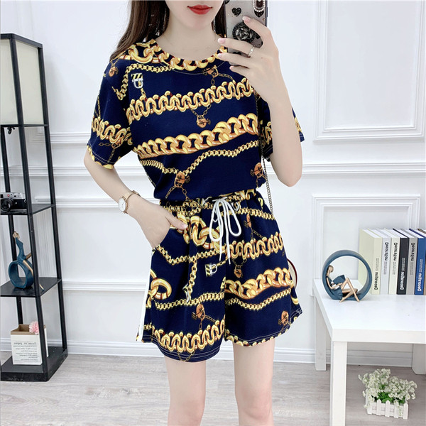 Модерен дамски комплект от две части с връзки и цветен принт