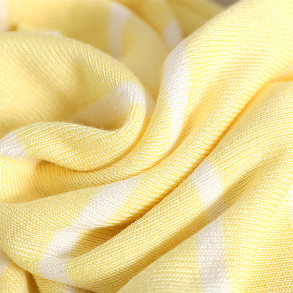 Csíkos női felső, gombokkal és széles pántokkal több színben