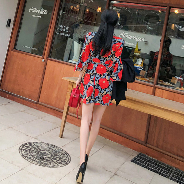 Καλοκαιρινό γυναικέιο φόρεμα με 3/4 μανίκι και floral μοτίβο