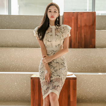 Κομψό γυναικείο φόρεμα με κεντήματα και κοντά μανίκια