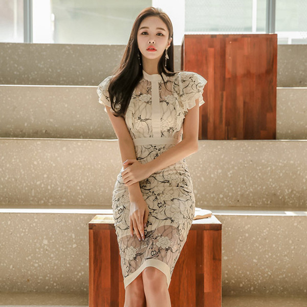 Κομψό γυναικείο φόρεμα με κεντήματα και κοντά μανίκια