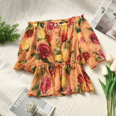 Κομψή γυναικεία μπλούζα με κουμπιά και φυτικά μοτίβα