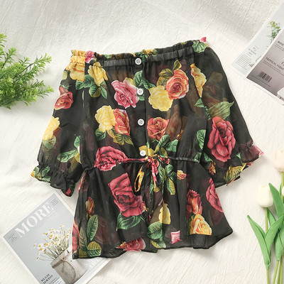 Κομψή γυναικεία μπλούζα με κουμπιά και φυτικά μοτίβα