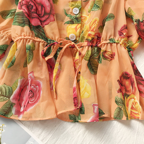 Κομψή γυναικεία μπλούζα με κουμπιά και φυτικά μοτίβα