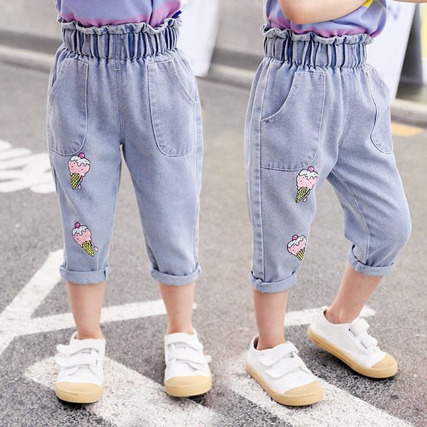 Modern gyerekfarmer hímzéssel és zsebekkel lányoknak