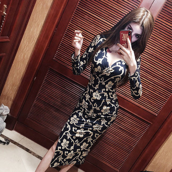 Γυναικείο κομψό φόρεμα με μακριά μανίκια και λαιμόκοψη σε σχήμα V