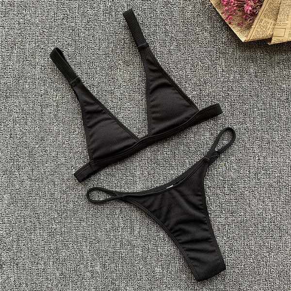 Kétrészes női fürdőruha háromszög alakú felsővel, fekete és sárga színben