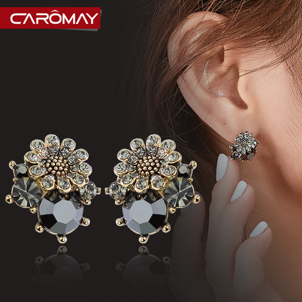 Női fülbevaló kövekkel és virággal