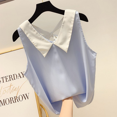 Női felső szalaggal a hátán