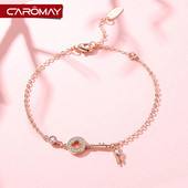 Női karkötő kövekkel és kulcsformával