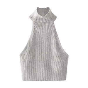 Rövid női felső gallérral és csupasz háttal