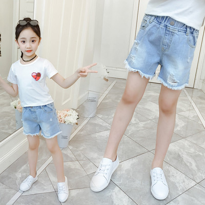 Szakadt motívumokkal ellátott rövid gyerekfarmer lányoknak