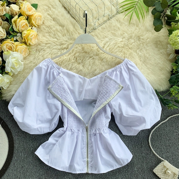 Σύγχρονη γυναικεία μπλούζα σε δύο χρώματα φερμουάρ