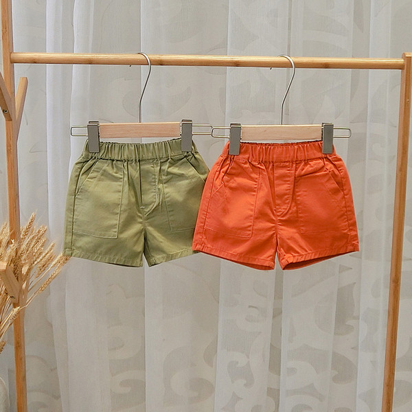 Детски къси панталони за момчета в зелен и оранжев цвят