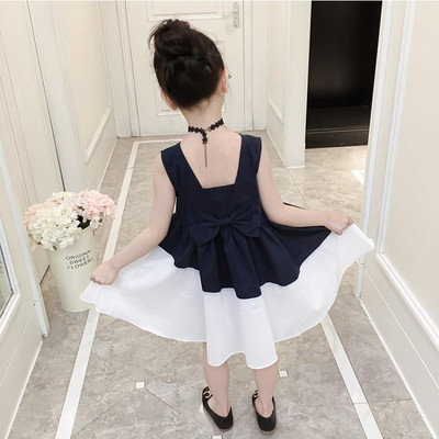 Актуална детска рокля разкроен модел с панделка 