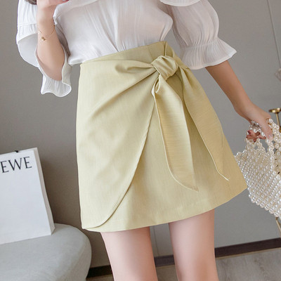 Modern női szoknya magas derékkal, fehér, fekete és sárga színekben