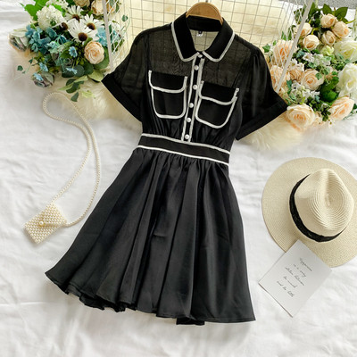 Κομψό γυναικείο φόρεμα με τσέπη και κοντό μανίκι σε λευκό και μαύρο χρώμα