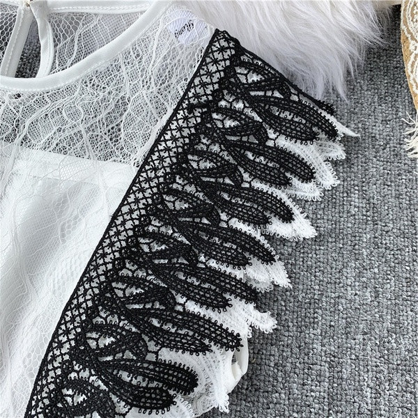 Modern női felső csipkével, fehér és fekete színben