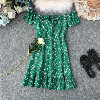 Μοντέρνο γυναικέιο φόρεμα  με γυμνούς ώμους και πράσινους δεσμούς