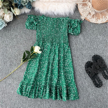 Μοντέρνο γυναικέιο φόρεμα  με γυμνούς ώμους και πράσινους δεσμούς