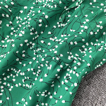 Μοντέρνο γυναικέιο φόρεμα  με γυμνούς ώμους και πράσινους δεσμούς