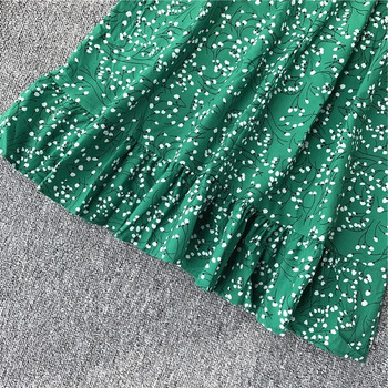 Μοντέρνο γυναικέιο φόρεμα  με γυμνούς ώμους και πράσινους δεσμούς