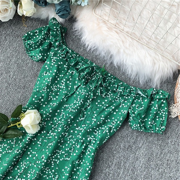 Μοντέρνο γυναικέιο φόρεμα  με γυμνούς ώμους και πράσινους δεσμούς